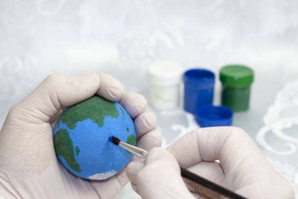 istock Painting the planet Earth. 1224803810