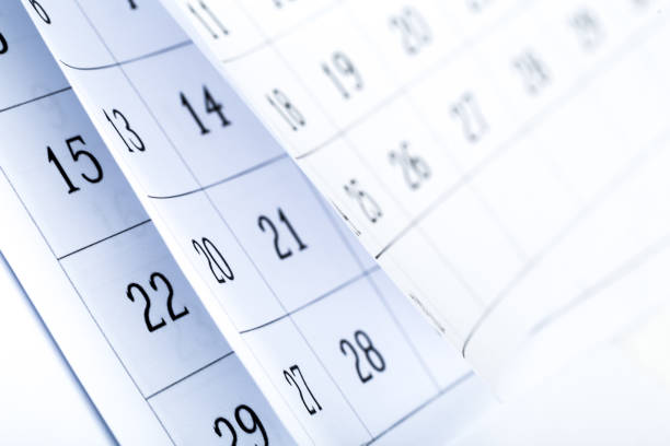 istock Closes a calendar page in blue. flipping calendar 2020 1224804964