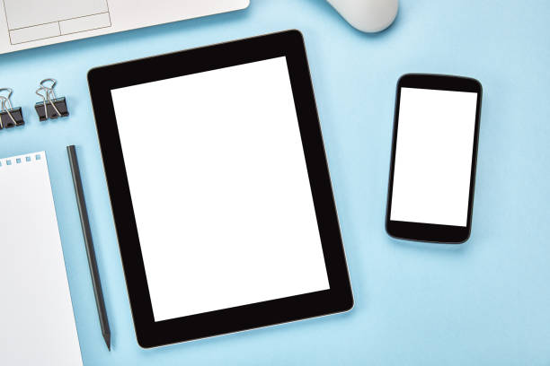 istock Tablet and mobile vertical screen mockup on blue background 1224805291