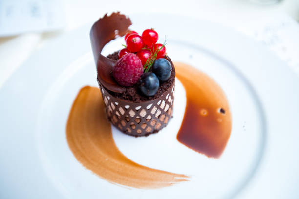 istock white plate with delicious cake with fruits, luxury concept 1224806547