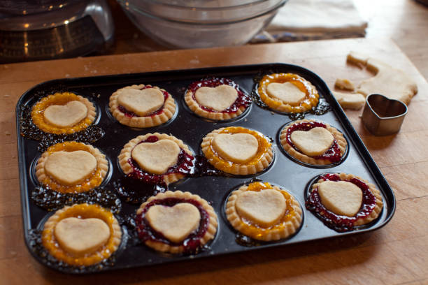 istock Home baking. Jam Tarts with hearrt shaped centres. 1224807282