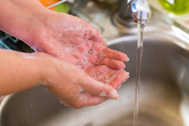 istock Giving those hands a thorough wash with soap and water 1224807867