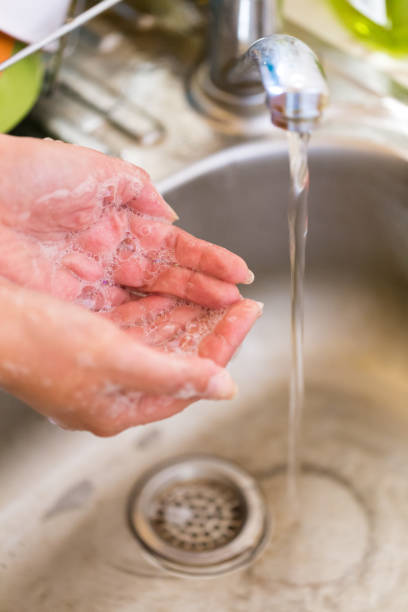 istock Giving those hands a thorough wash with soap and water 1224807899