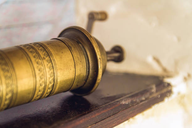Vintage hand cranked coffee grinder isolated on white backgrounds work with clipping path