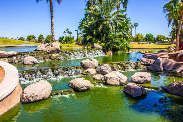 istock Public Park Ponds With Waterfalls 1224811221