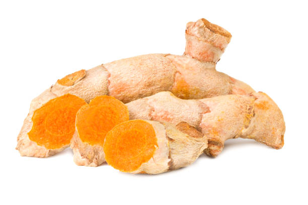 istock Turmeric root with slices isolated on white background 1224811615
