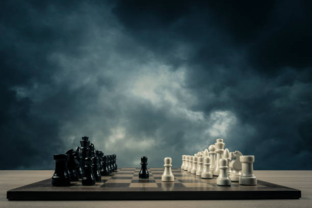chess opening in front of storm clouds chess opening knight chess piece photos stock pictures, royalty-free photos & images