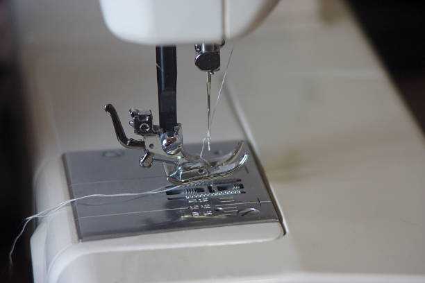 istock the mechanism of the sewing machine with thread 1224815513