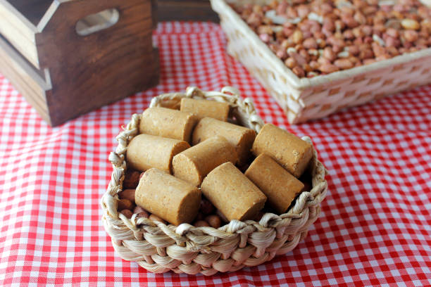 istock Peanut candy (paçoca or pacoca) traditional Brazilian sweet based on peanuts, manioc flour and sugar on a rustic wooden table 1224817280