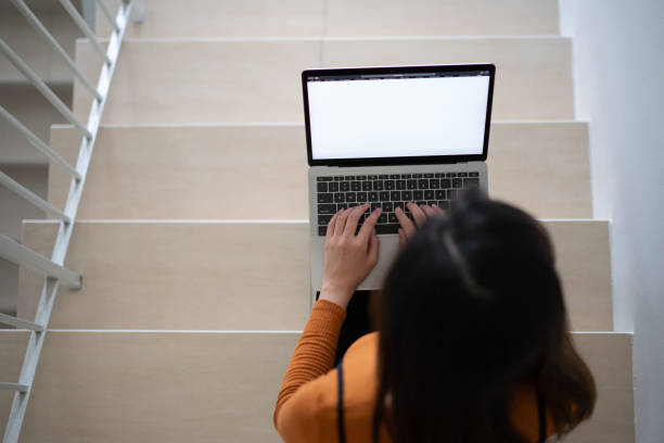 istock Young woman working from home with her laptop computer 1224818061