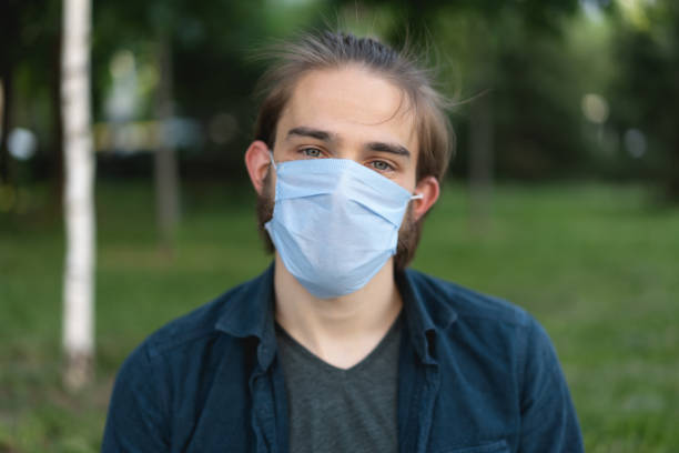 istock Young man wearing protective face mask during Covid-19 quarantine 1224818224