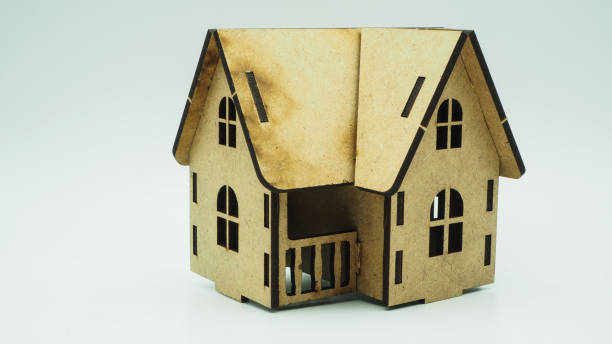 istock House model made of cardboard. In white backgrou 1224819497