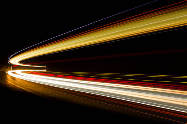 istock Car light trails on the road 1224819833