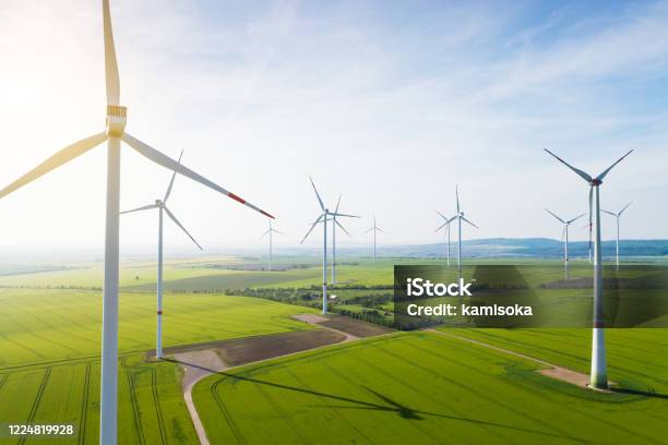Aerial View Of Wind Turbines And Agriculture Field Stock Photo - Download Image Now - Wind Turbine, Sustainable Resources, Wind Power