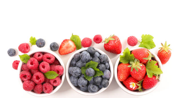 istock assorted of berry fruit- blueberry, strawberry and raspberry isolated on white background 1224820814