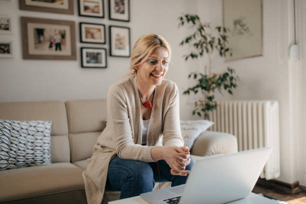 istock Mid adult woman working during lockdown 1224821479