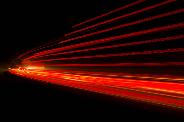 istock Car light trails on the road 1224821546