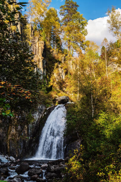 istock Waterfall in the autumn mountain forest 1224825547