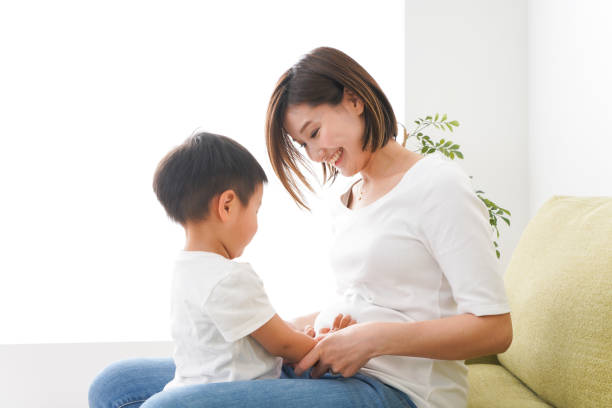 istock Children and mother playing at home 1224829478