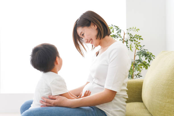 istock Children and mother playing at home 1224829481