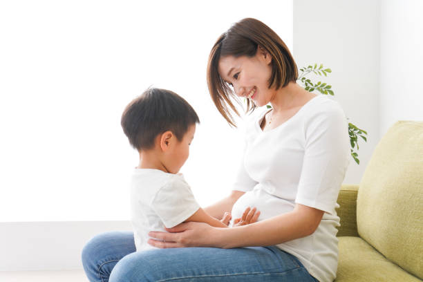 istock Children and mother playing at home 1224829483