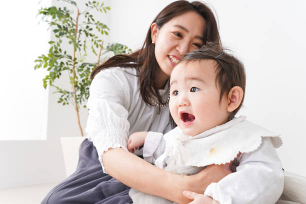 istock Baby playing with mom at home 1224830685