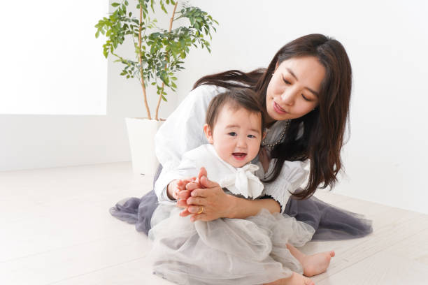istock Baby playing with mom at home 1224830688