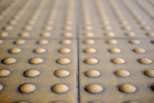 istock Yellow Braille Block , Dirty Braille Tile 1224833344