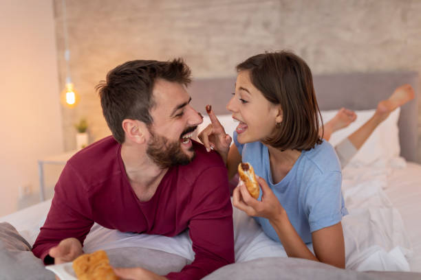 istock Couple eating breakfast in bed 1224834711