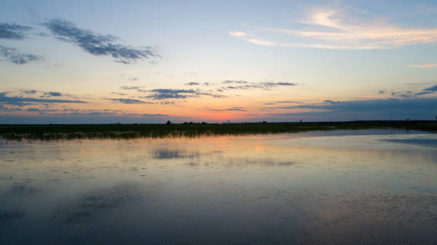 istock Mobile Bay at sunset in May 2020 1224836244