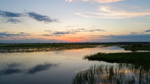 istock Mobile Bay at sunset in May 2020 1224836861