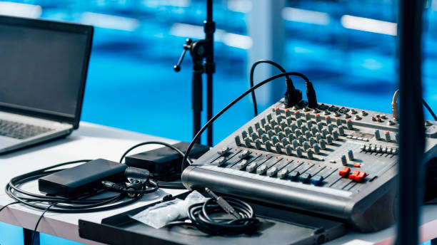 istock Press Conference Event. Laptop Computer And Audio Mixer 1224837462