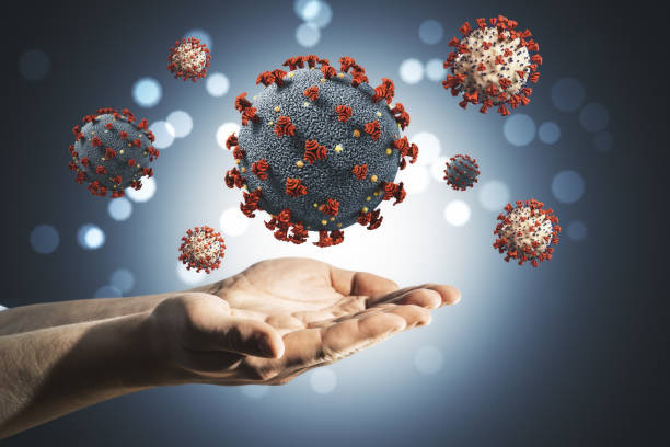 istock Hands holding gray coronavirus 2019-ncov flu infection. 1224837982