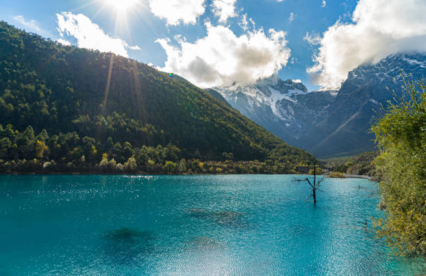 istock Blue lake reflecting the clouds 1224838129