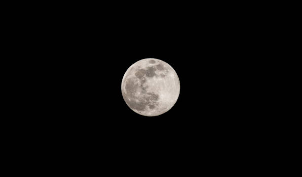 istock The full moon in the dark sky, astronomical concept 1224838356