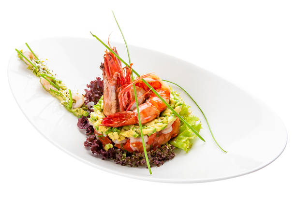 istock Salad with Royal shrimps and avocado on white background 1224841515