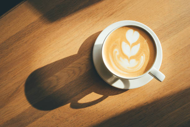 istock Cup of cappuccino on wooden table. 1224847223