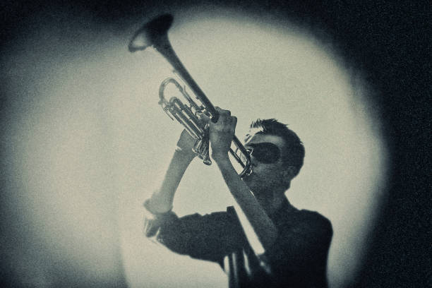istock The Trumpet Player with the Mask 1224848477
