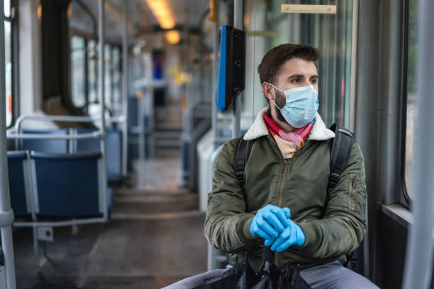 istock Man travelling alone in the empty city tram during Covid-19 quarantine 1224848588