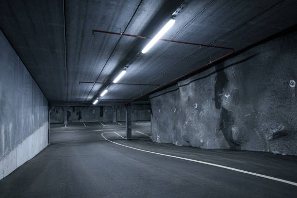 istock Moody looking car parking lot 1224850007