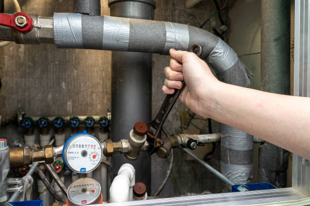 istock plumbing cabinet. shut off hot or cold water 1224850030