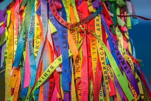 Brazilian Colorful Senhor do Bonfim wish ribbons on the wall, Porto Seguro - Bahia, northeast Brazil