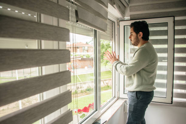istock Young man clapping during the COVID-19 lockdown 1224850984