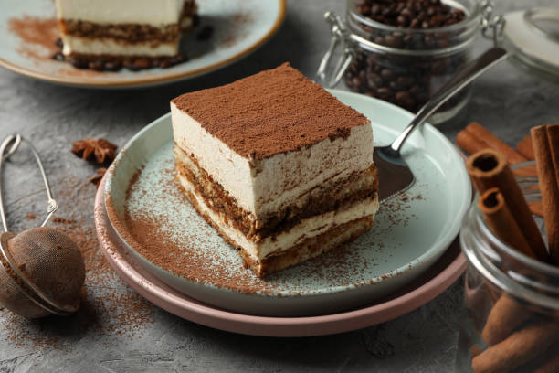 istock Composition with tiramisu, coffee and cinnamon on gray table 1224855182