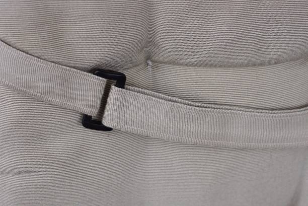 istock black plastic snap hook latch on the harness on the gray fabric 1224855938