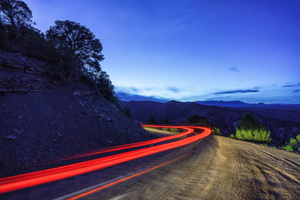 istock Night Driving Mountain Dirt Road Time Exposure 1224858119