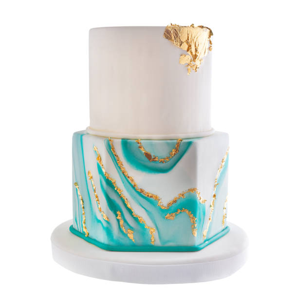 Modern gold leaf tiered cake stock photo