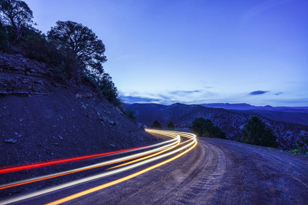 istock Night Driving Mountain Dirt Road Time Exposure 1224858404