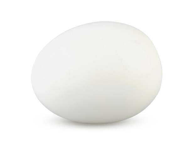 istock Boiled egg unshelled isolated on white background. Cooked chicken egg close up 1224858486