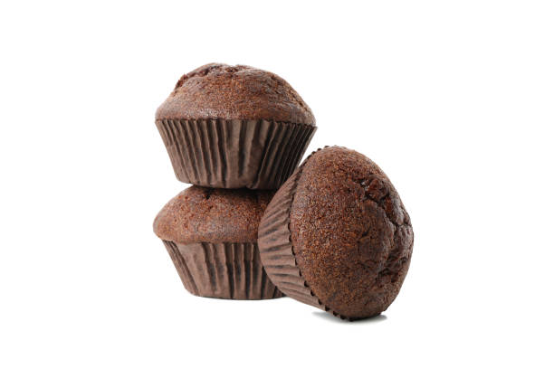 istock Delicious chocolate muffins isolated on white background 1224860208